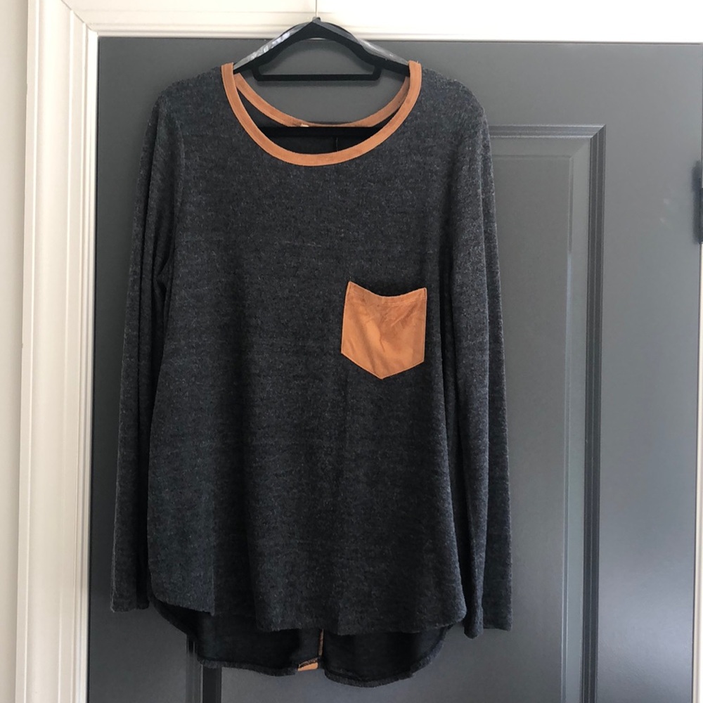 Tee shirt with suede like detail.